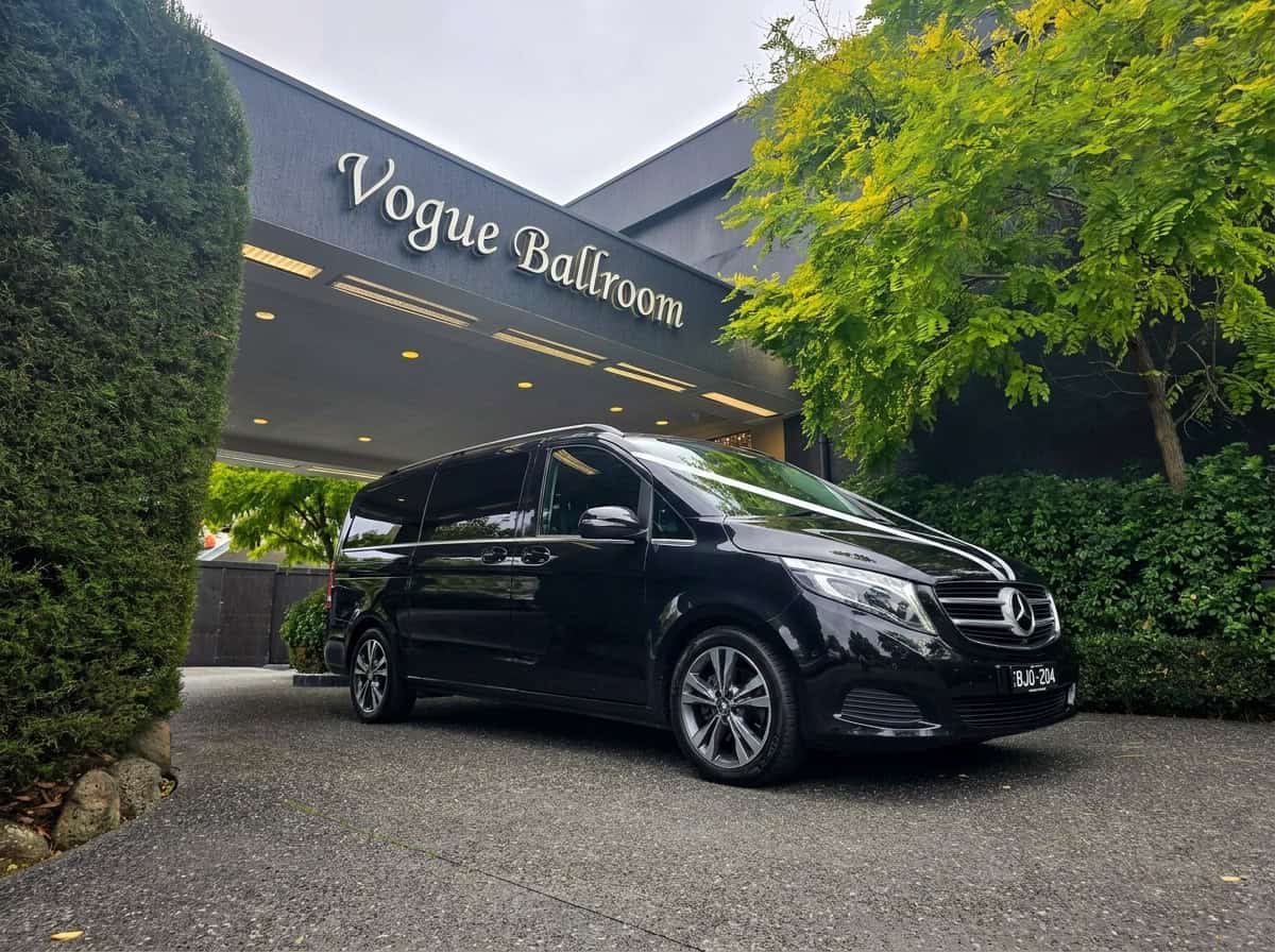Black Mercedes-Benz V-Class wedding car with registration BJO 204 parked outside Vogue Ballroom Melbourne

Caption
