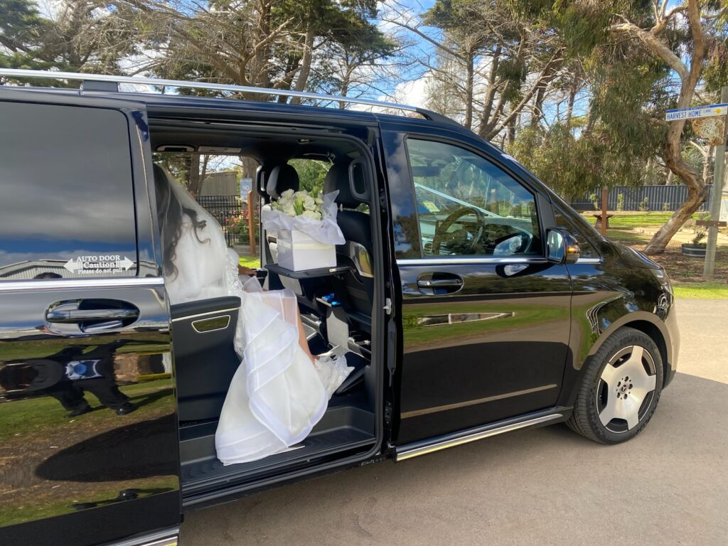 Bride inside Mercedes V-Class Executive — luxury wedding car Melbourne